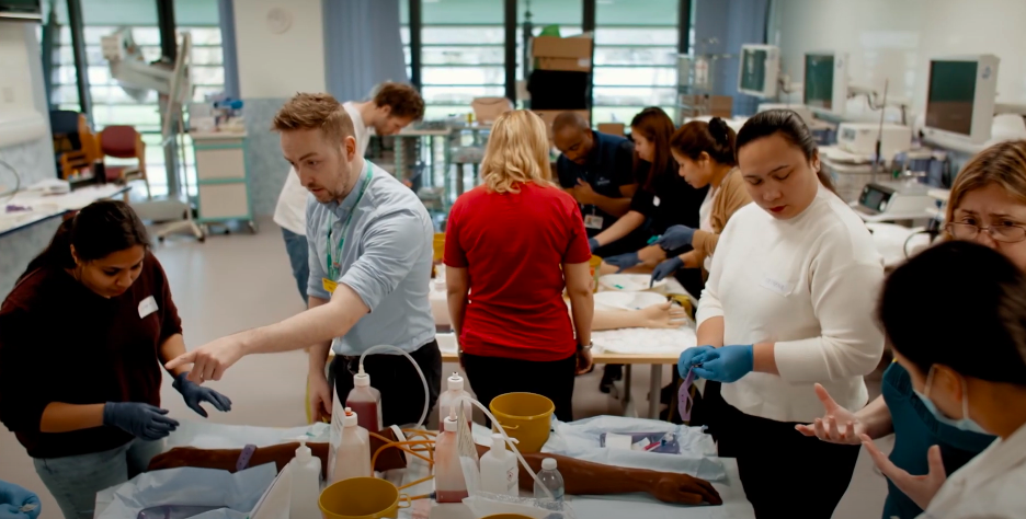 classroom of people working together